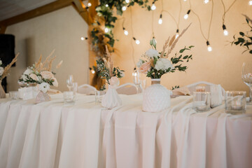 wedding decor on the table in the restaurant