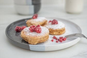 sweet home made vanilla pancakes with raspberries