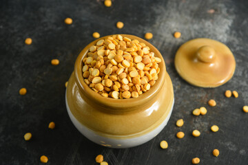 Various sources of vegetable protein beans, lentils, peas, chickpeas, mung bean in bowls. Indian Pulses uncooked , Lentils, Rice healthy balanced diet for vegans and vegetarians. Legumes assortment