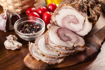 Baked pork belly roulade. Bacon rolls