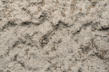 Grey grunge stone background. Mountain texture. Close-up. Volumetric. The rocky background. Copyspace