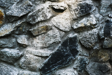 large stones, stone wall, ancient castle wall, dark textured walls