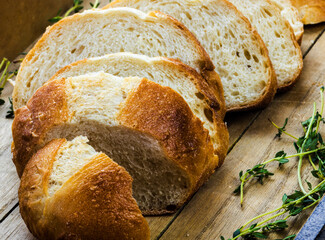 cut bread on wooden board