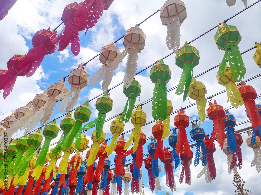 Wall mural Colorful lanterns for religious beliefs. Handmade crafts made of paper.