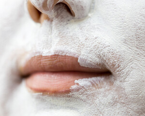 woman weight face white cream close up