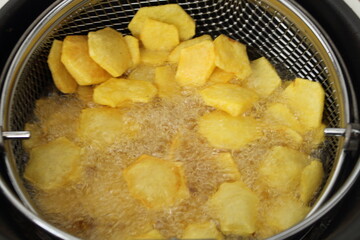 fresh crispy french fries from the deep fryer