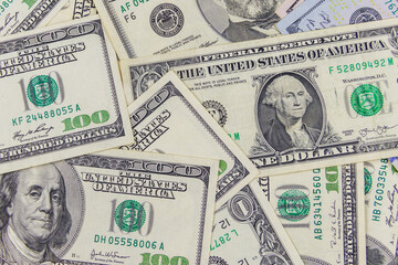 Background of different us dollar banknotes