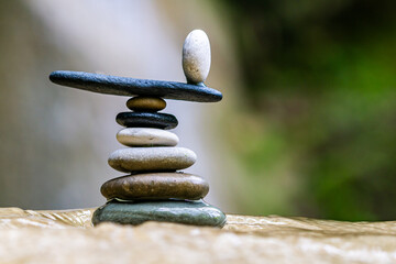 Balanced Zen stones at the waterfalls