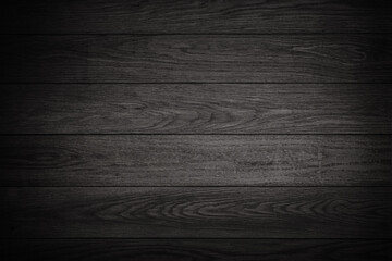Naklejka premium Vignette Images backdrop, Wood texture, black wood texture panel in spotlight for Product showcase, wooden signboard, 