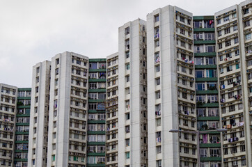 Residential area in old apartment with windows. High-rise building, skyscraper with windows of...