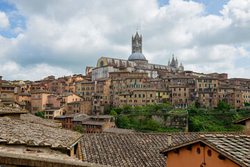 SIENA, ITALY - APRIL 26, 2019: View to the old town in Siena, Italy