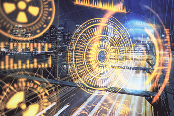 Double exposure of technology theme hologram and cityscape background. Concept of Hightech.