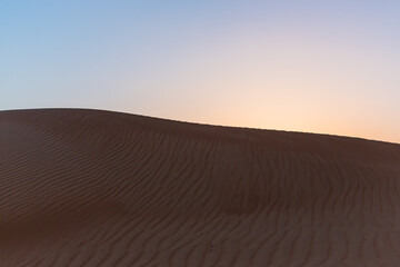 Fototapeta na wymiar 夕暮れ時のオマーンの砂漠 