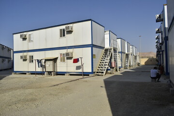 Portacabin, porta cabin, temporary labors camp , Mobile building in industrial site or office container Portable house and office cabins. Labor Camp. Porta cabin. small temporary houses