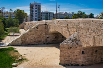 Fototapeta na wymiar Trinity Bridge over the old Turia riverbed in Valencia