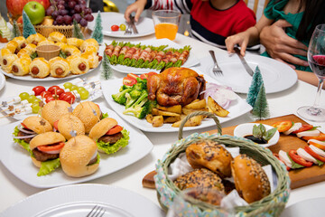 Roasted  chicken  with sauce and grilled autumn vegetables: corn  on wooden table, top view, frame. Christmas or Thanksgiving Day or christmas ,new year  food concept.