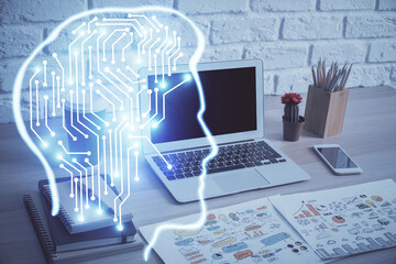 Multi exposure of work space with computer and human brain hologram. Brainstorm concept.