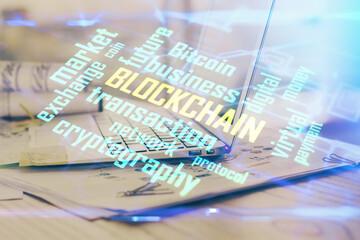 Naklejka premium Double exposure of blockchain theme hologram and table with computer background. Concept of bitcoin crypto currency.