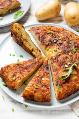 Spanish Tortilla, Pincho de Tortilla. Homemade spanish omelette with potatoes and eggs.