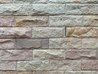 Natural white color stone brick wall background 
