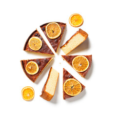 Sliced Semolina cake decorated with dried orange slices.isolated on white background