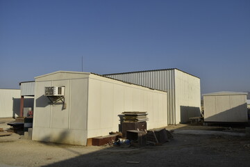 Industrial warehouse construction and interior and outdoor view of the roof ceiling structure. Muscat, Oman