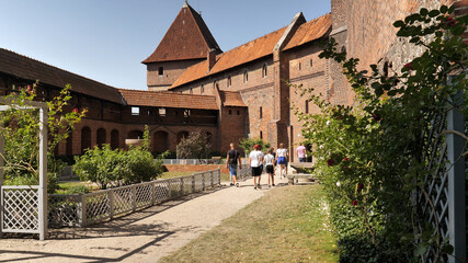 Fototapeta na wymiar Castle of the Teutonic Order in Malbork. Southern Terrace - Rose Garden