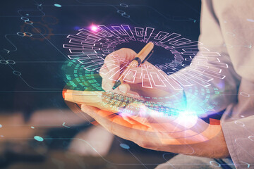 Writing human hands with tech theme multi exposure icons.