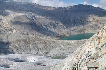lares glacier and small lake in a day of summer