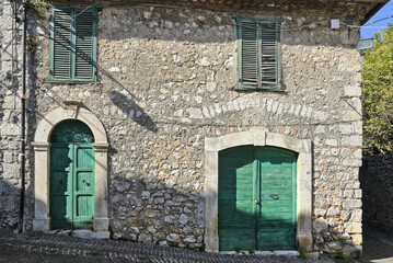 A narrow street between the old houses of the town of Vico nel Lazio, in the province of Frosinone.