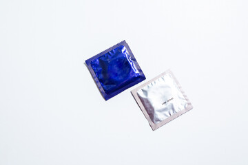 Condom packs on a white background. Safe sex concept