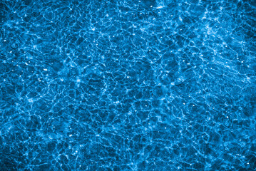 Shallow ripple on the surface of the sea water - beautiful water blue background