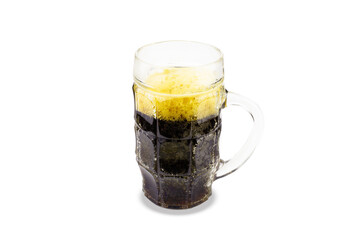 Glass mug of dark beer with yellow foam. Isolated on white background.