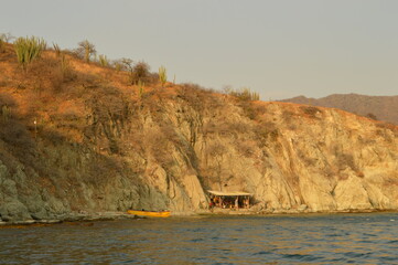 The stunning beaches and mountains of Parque Nacional Natural Tayrona in Santa Marta region of...