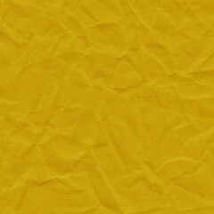 Yellow vintage and old looking crumpled paper background. Retro cardboard texture. Grunge paper for drawing. Ancient book page. Present wrapping.