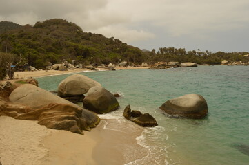 The stunning beaches and mountains of Parque Nacional Natural Tayrona in Santa Marta region of...