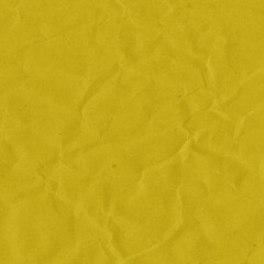 Yellow vintage and old looking crumpled paper background. Retro cardboard texture. Grunge paper for drawing. Ancient book page. Present wrapping.