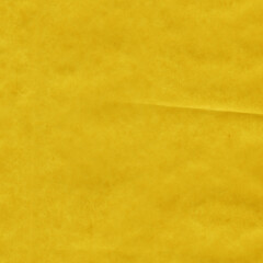 Yellow vintage and old looking crumpled paper background. Retro cardboard texture. Grunge paper for drawing. Ancient book page. Present wrapping.