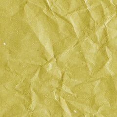 Yellow vintage and old looking crumpled paper background. Retro cardboard texture. Grunge paper for drawing. Ancient book page. Present wrapping.