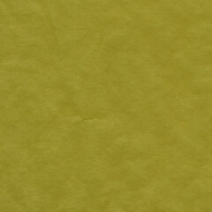 Yellow vintage and old looking crumpled paper background. Retro cardboard texture. Grunge paper for drawing. Ancient book page. Present wrapping.