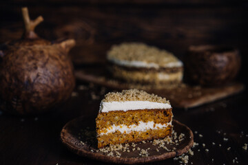 carrot cake slice of one piece, home baking photo in dark colors. High quality photo