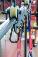 A row of metal carabiners. Bungee jumping attachment system. Selective focus
