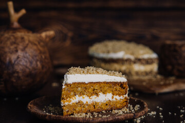 carrot cake slice of one piece, home baking photo in dark colors. High quality photo
