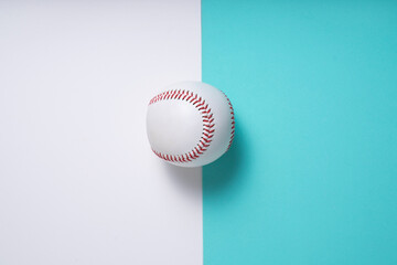 baseball on green and white background, top view