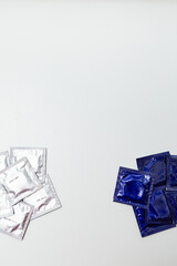 Condom packs on a white background. Safe sex concept