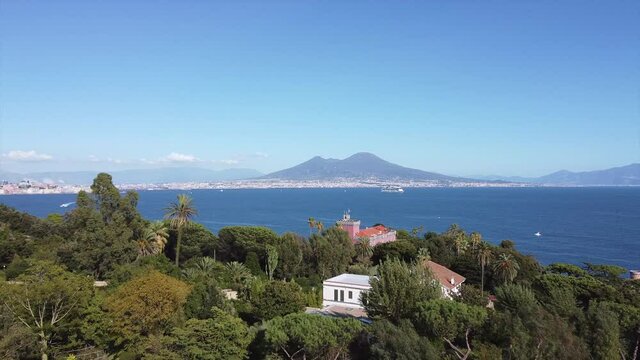 Reverse drone shot Landscapes of Naples bay and Volcano Vesuvius