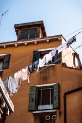 shirts and laundry drying in the streets of venice