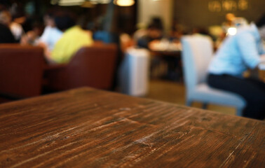 Wood Table Top in Blur Background room interior with empty copy space.