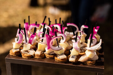 A set of canapes at a banquet with blurred background