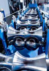 Metal sheet forming machine at the modern metalwork factory.